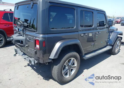 2022 Jeep Wrangler Unlimited Sahara 4X4 from USA, damaged, VIN 1C4HJXEM9NW243895